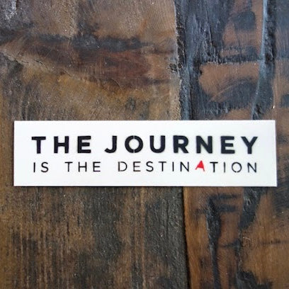 Story behind "The Journey is the destination" sticker